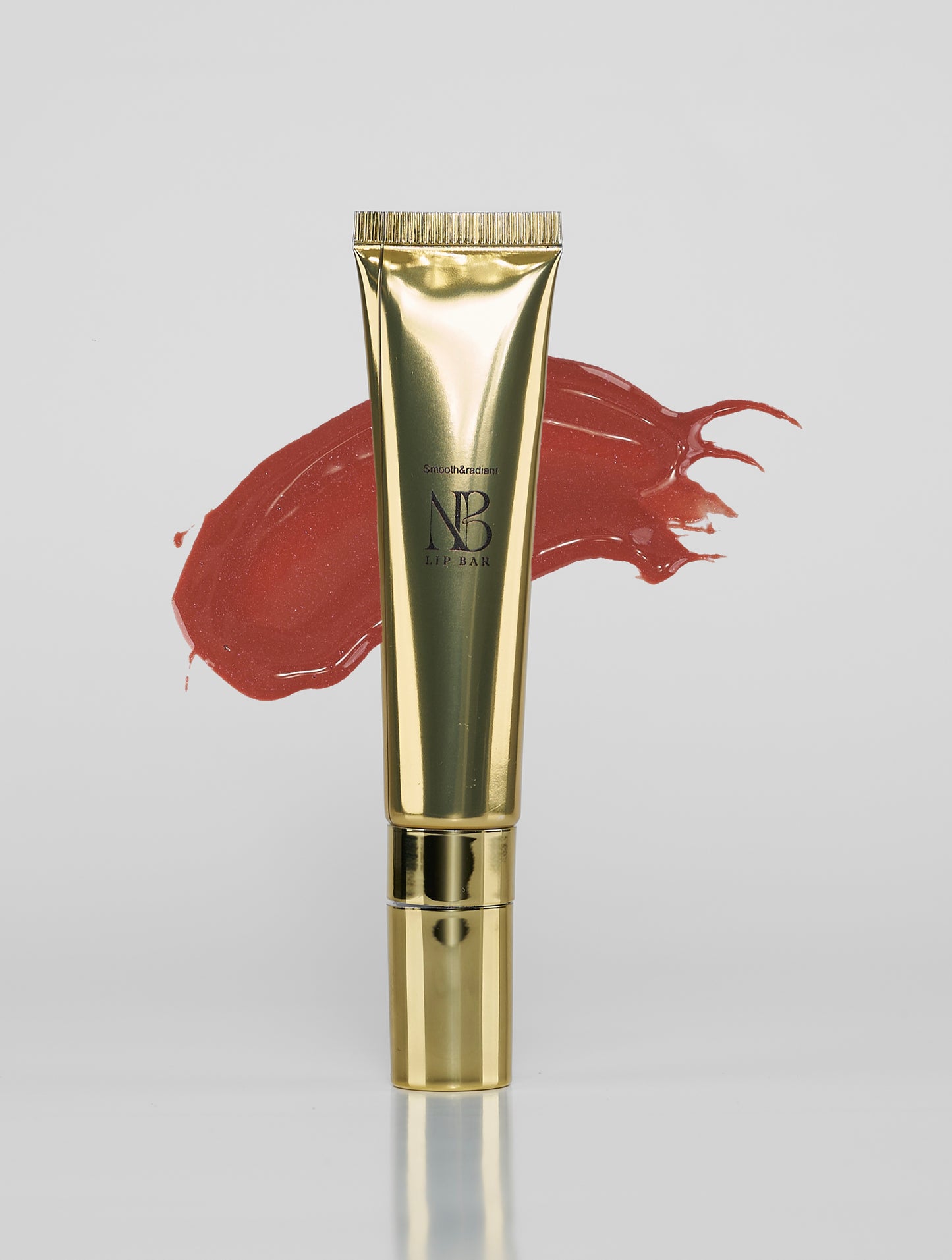 THE SIGNATURE SHINE// NUDE BLOSSOM LIP GLOSS